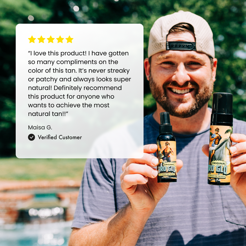 Man holding two tan product bottles displays five-star review testimonial about natural-looking color.