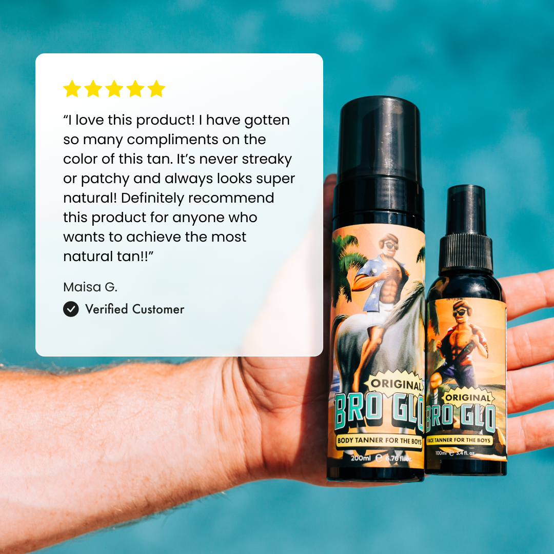 Hand holding two spray tan bottles with vintage pin-up artwork against turquoise background, beside five-star customer review.